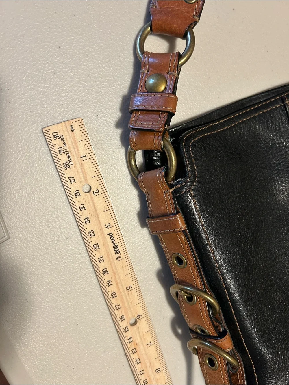Coach sleek black